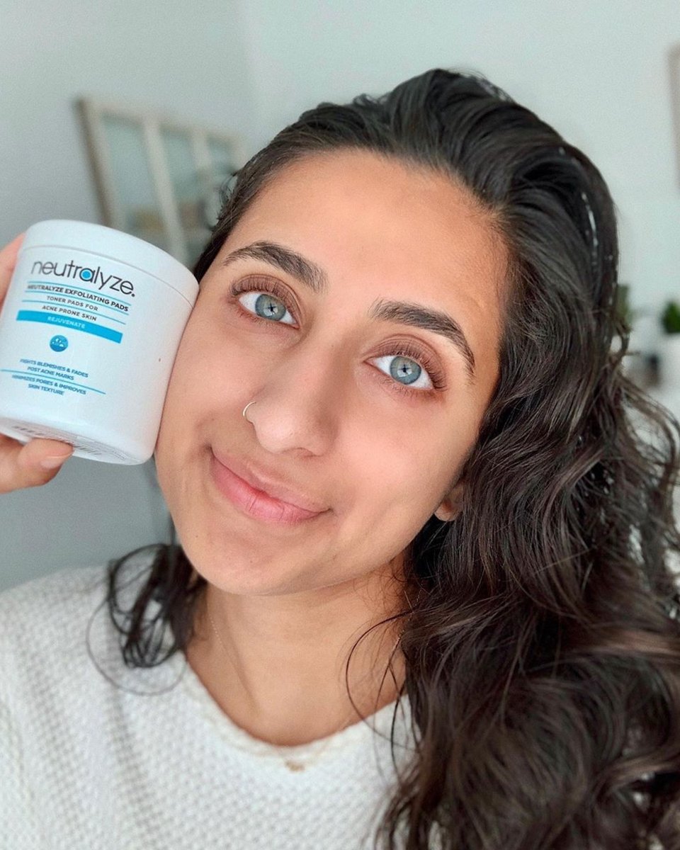 Neutralyze customer holding her product