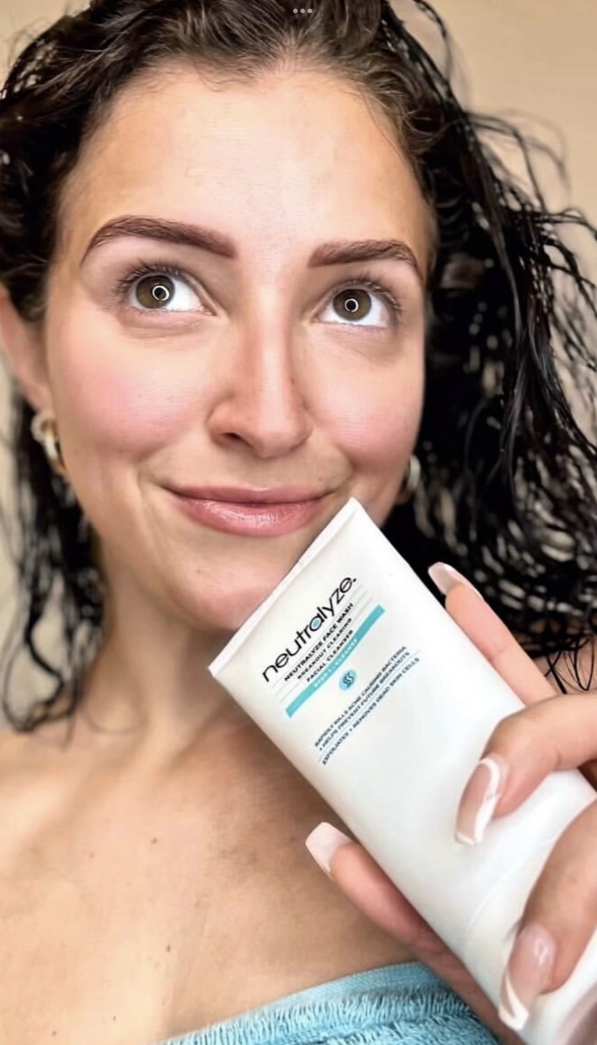Neutralyze customer holding Face Wash