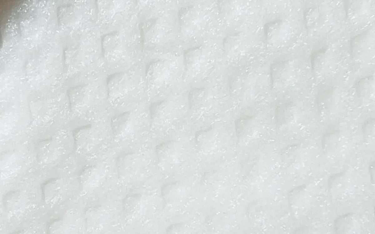 Close-up of the textured surface of a Neutralyze pad