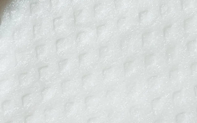 Close-up of the textured surface of a Neutralyze pad